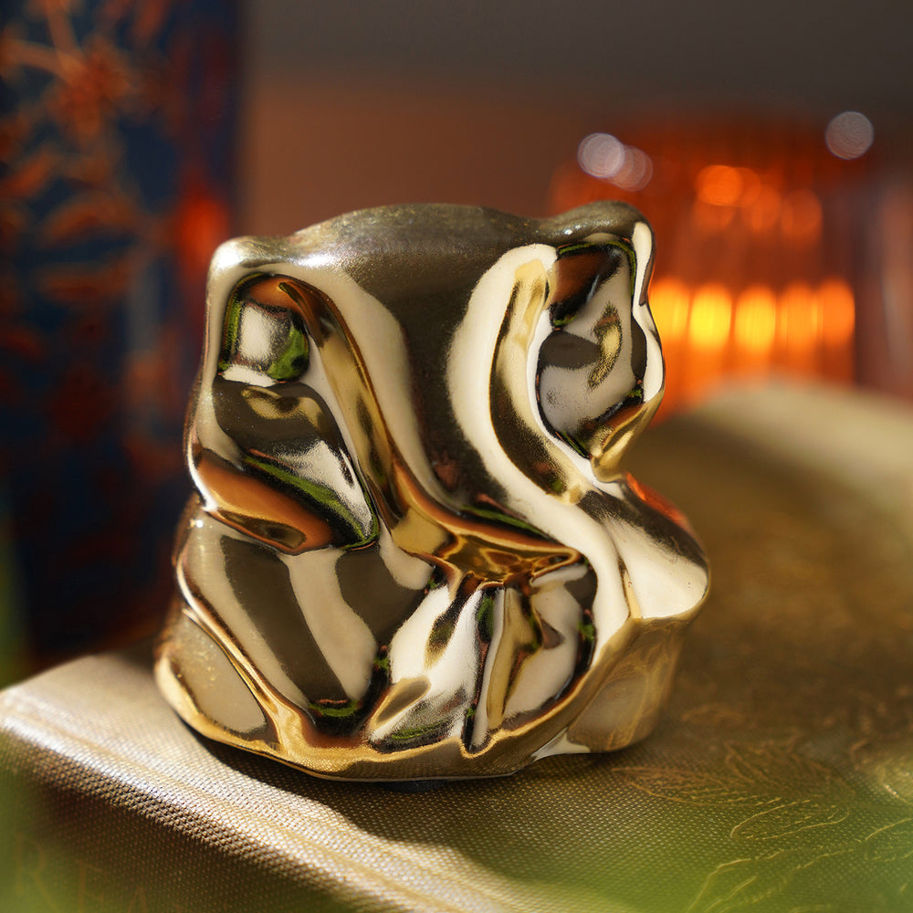 Gold Sitting Ceramic Ganesha Figurine
