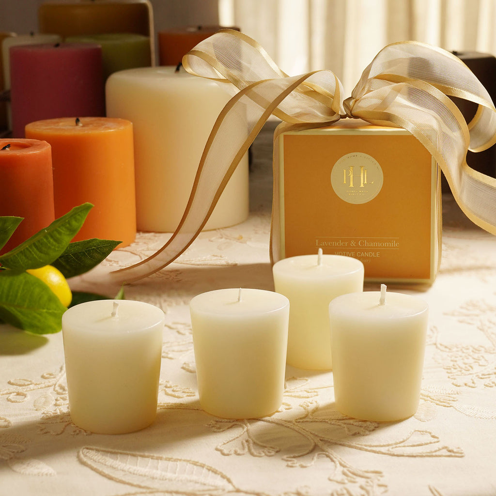 Shop Set of 4 White Lavender & Chamomile Votive Candles - at Best