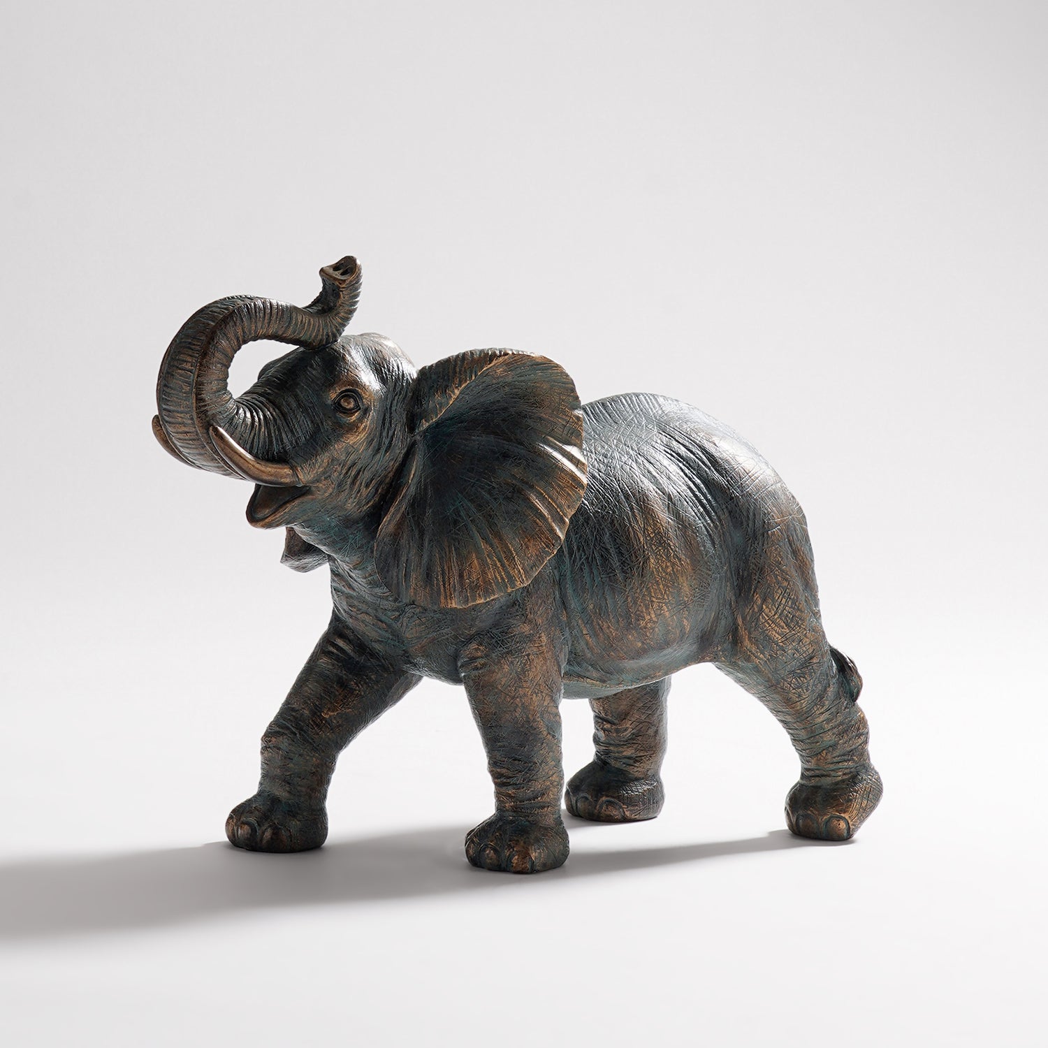 Shop Copper Polyresin Walking Elephant - Large - at Best Price