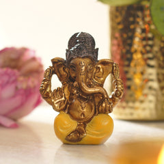 Yellow Antique Gold Polyresin Sitting Ganesha - Small