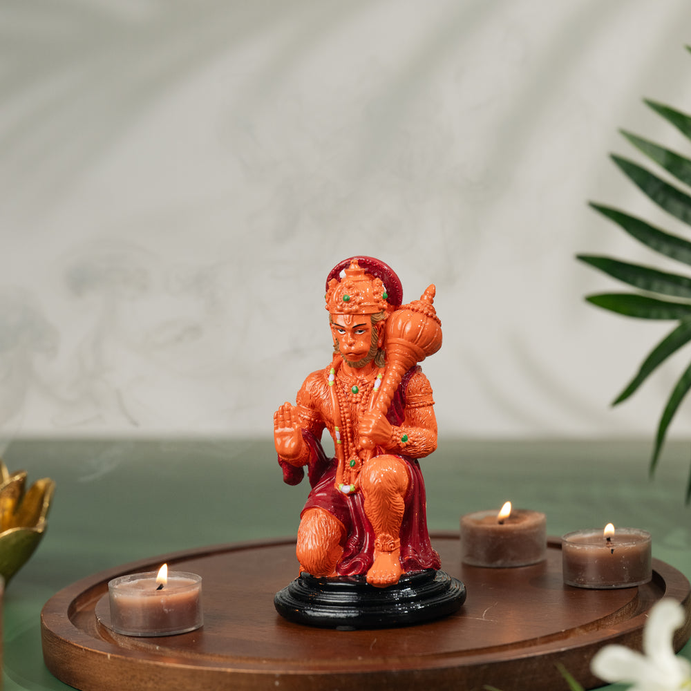Orange Polyresin Sitting Lord Hanuman Idol
